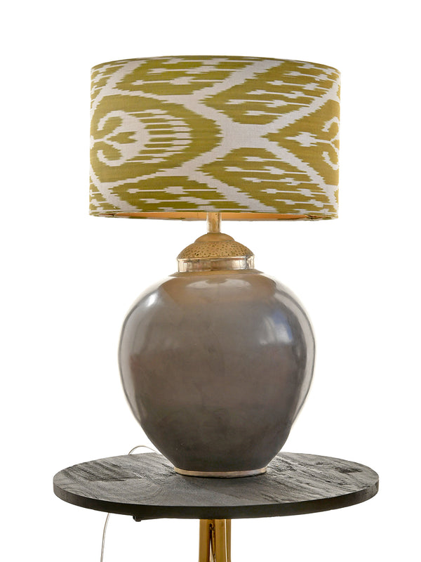 Silk lampshade with a green and white ikat pattern
