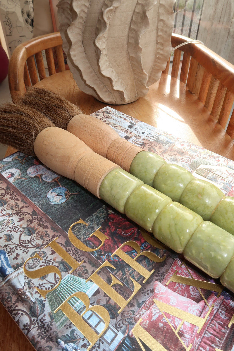 Decorative brush with red stones