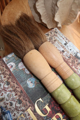 Decorative brush with red stones