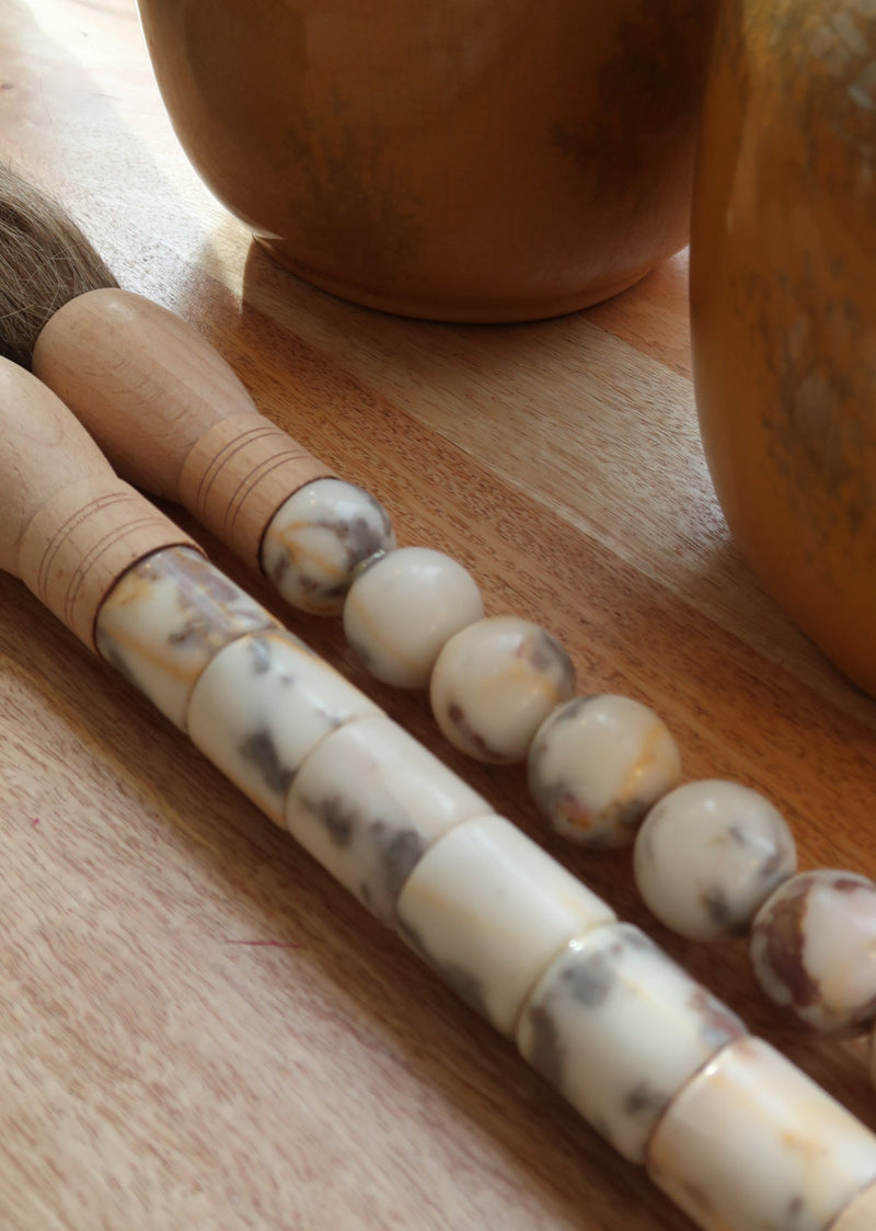 Decorative brush with red stones