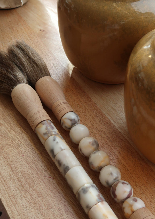 Decorative brush with red stones