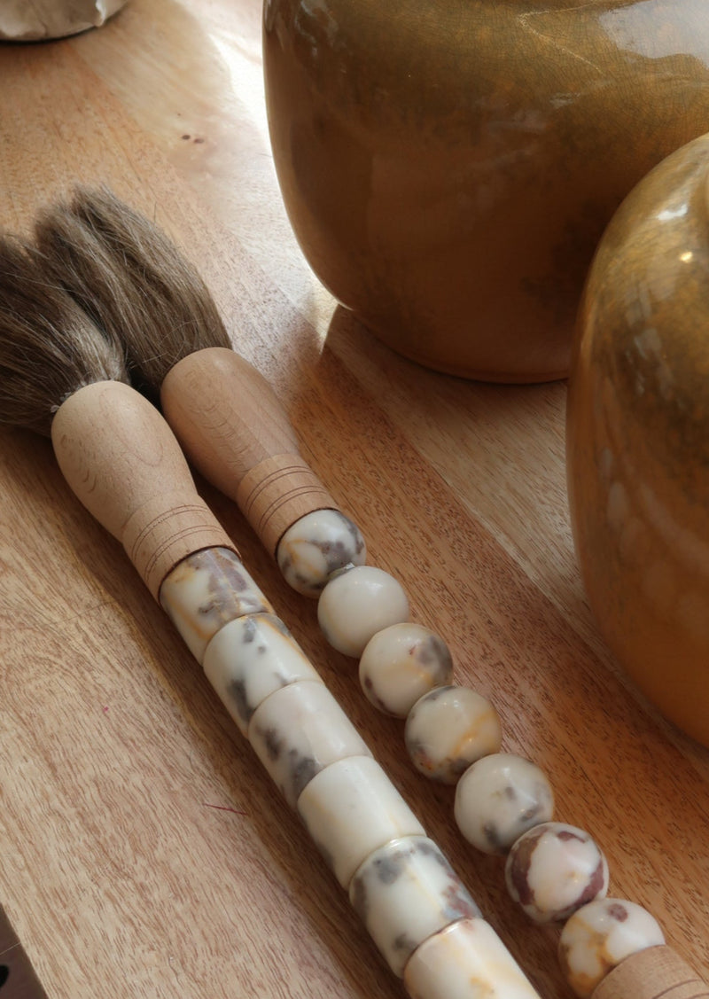 Decorative brush with red stones