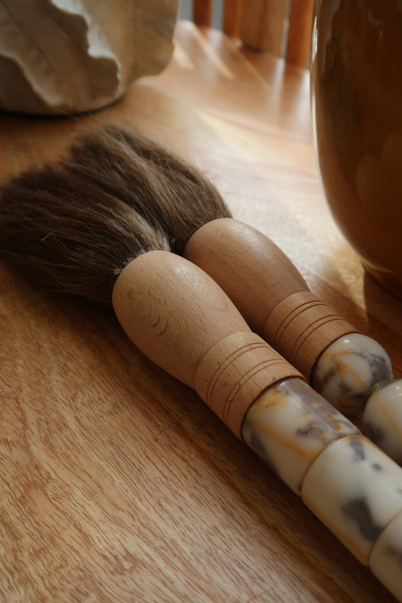 Decorative brush with red stones