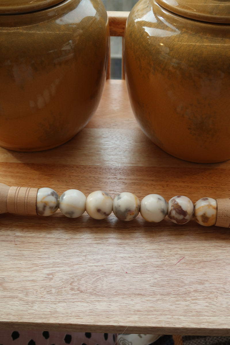 Decorative brush with red stones