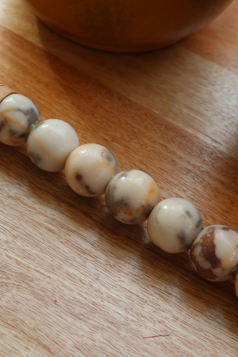 Decorative brush with red stones