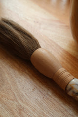 Decorative brush with red stones