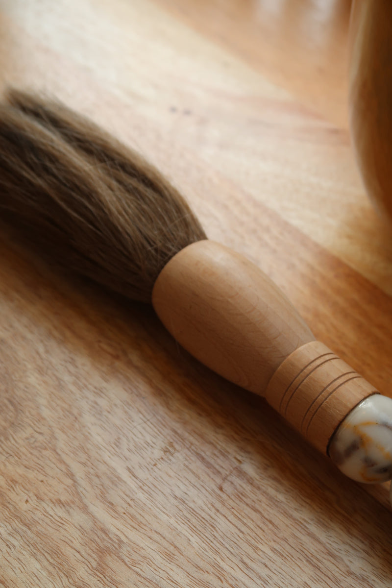 Decorative brush with red stones