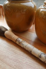 Decorative brush with red stones