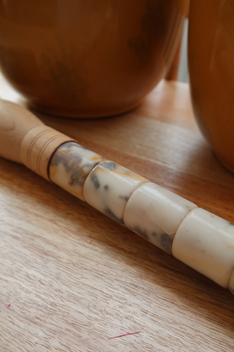 Decorative brush with red stones