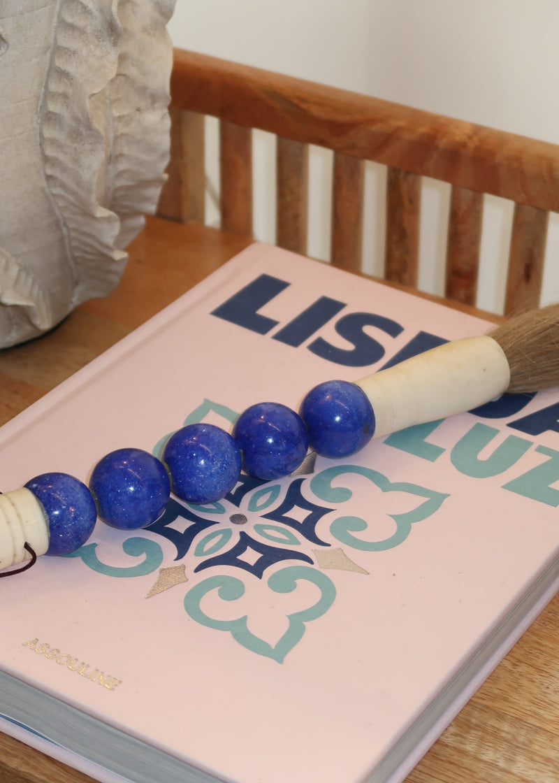 Pincel com peças redondas em Azul Atlântico