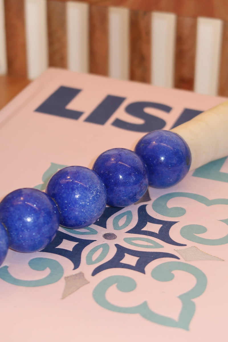 Pincel com peças redondas em Azul Atlântico