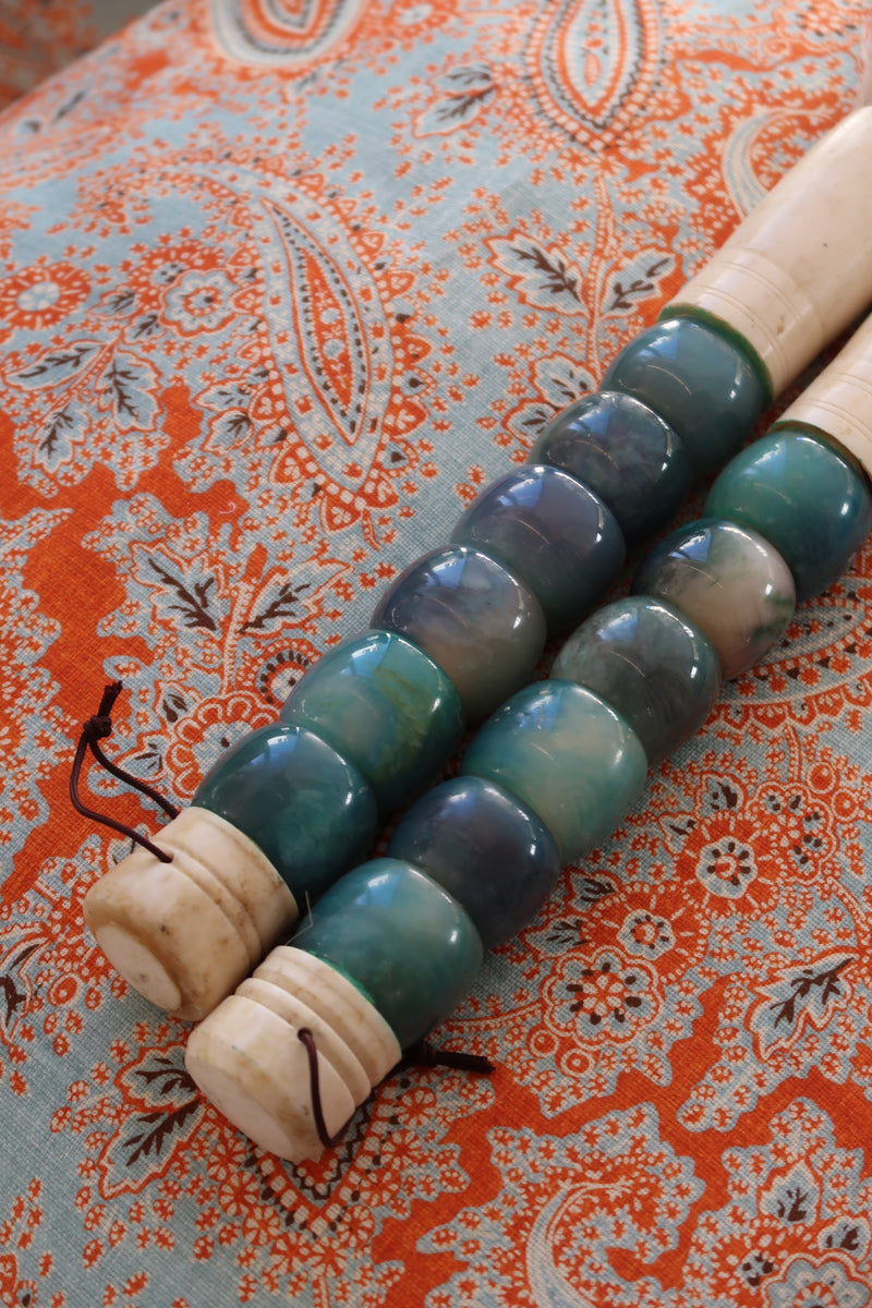 Pincel decorativo em tons verde jade