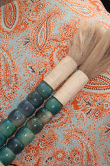 Pincel decorativo em tons verde jade