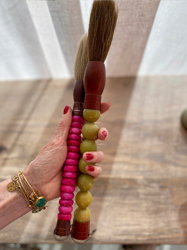 Decorative brush with lime green stones