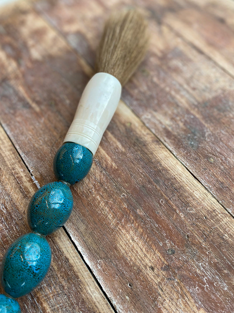 Decorative brush with turquoise blue stones