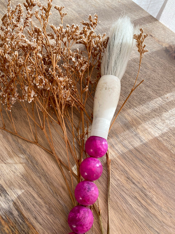 Decorative brush with pink stones