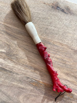 Pincel decorativo em forma de coral vermelho