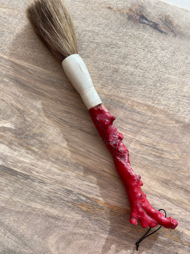 Pincel decorativo em forma de coral vermelho