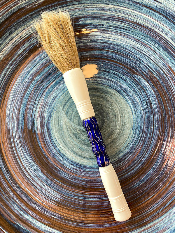 Decorative blue decorative brush with silver details