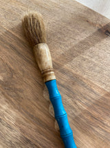 Decorative brush in blue