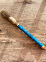 Decorative brush in blue