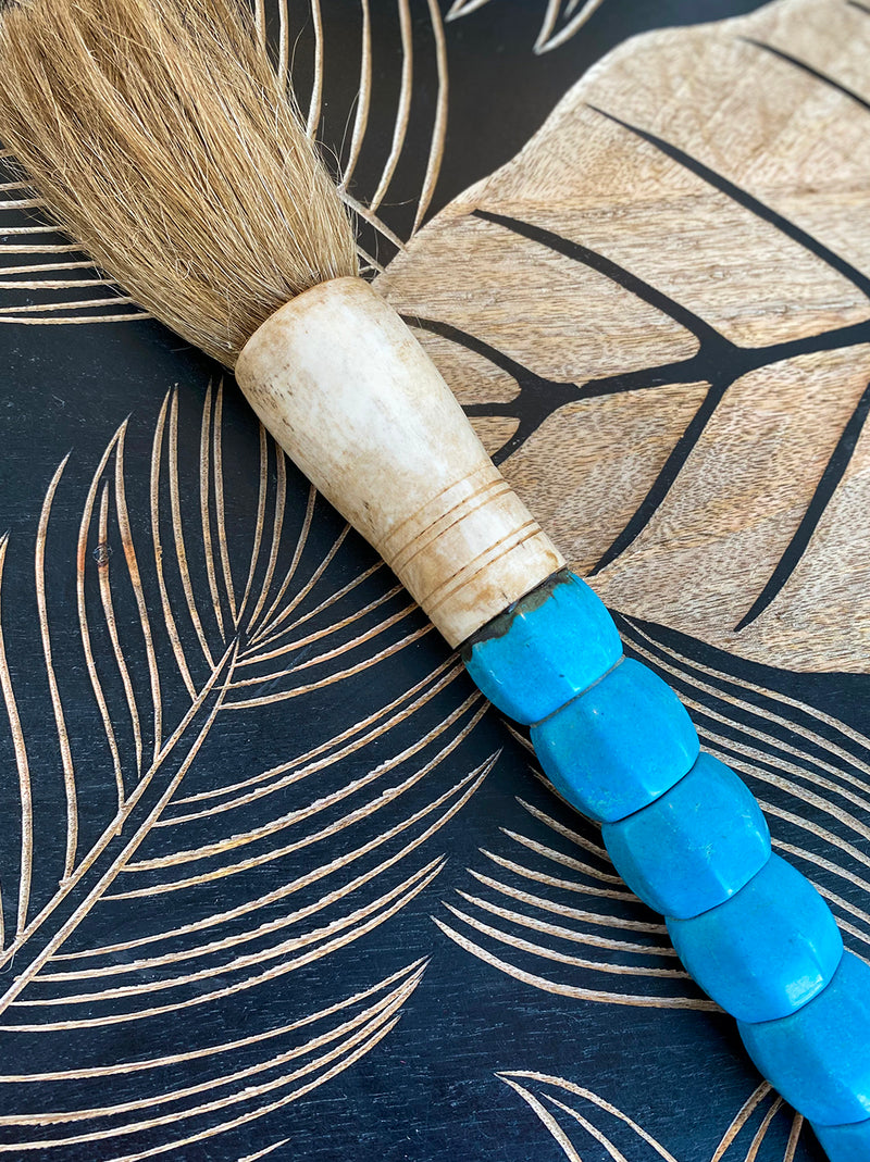 Decorative brush with turquoise blue stones