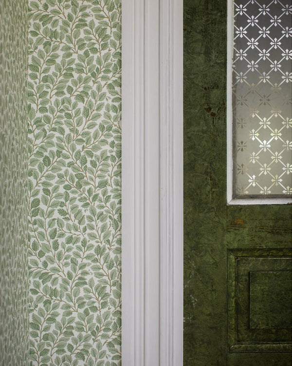 Papel de parede com padrão de folhas verde