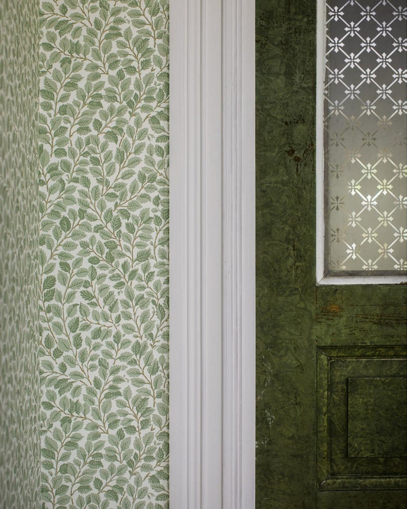 Papel de parede com padrão de folhas verde